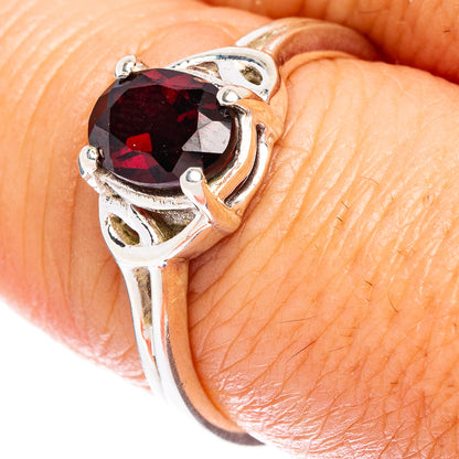Sterling silver garnet ring close-up, size 8, faceted dark red stone, split bands