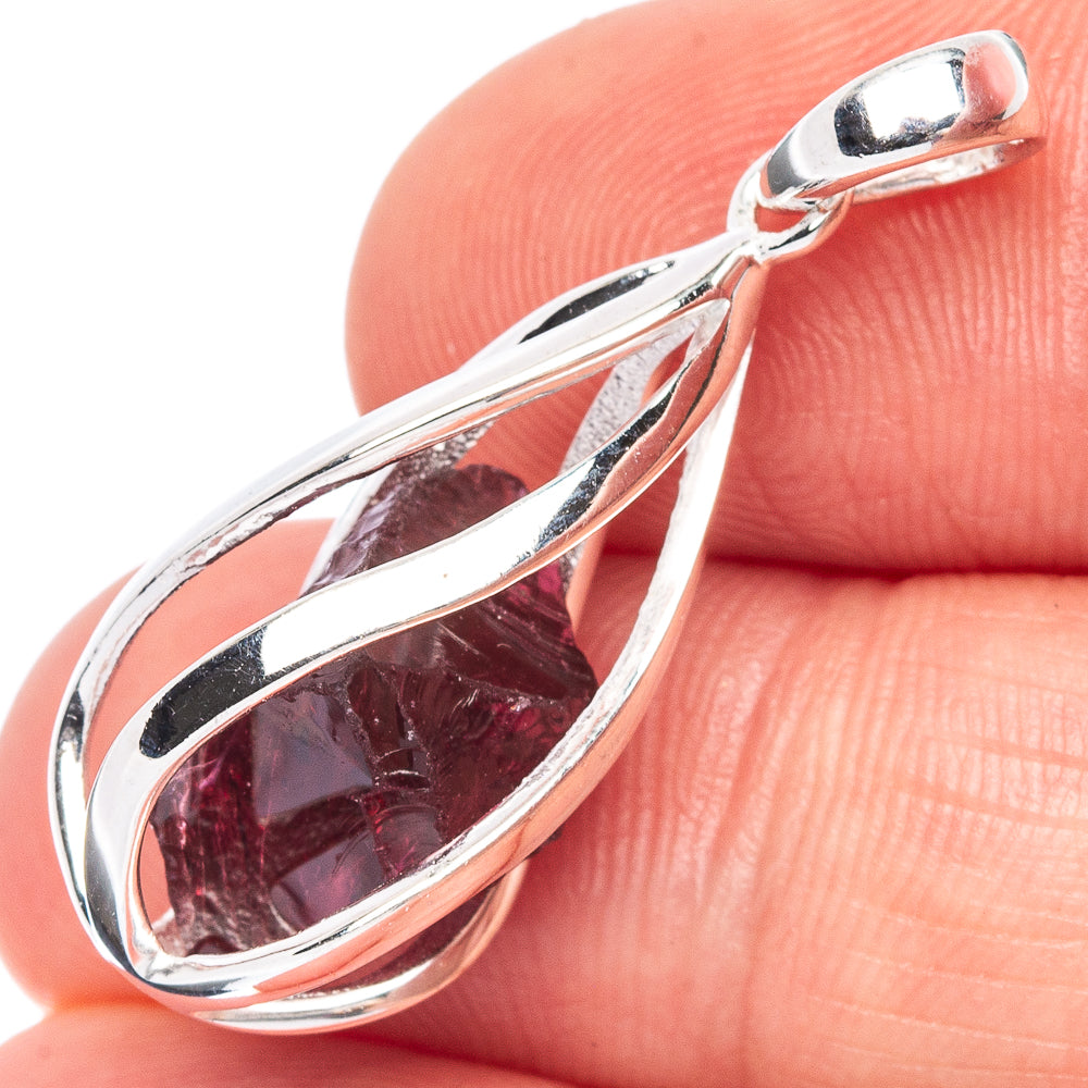 Sterling silver amethyst teardrop pendant with faceted purple gemstone bezel