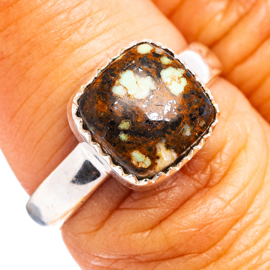 Size 7 .925 sterling silver ring with oval turquoise stone cabochon bezel setting