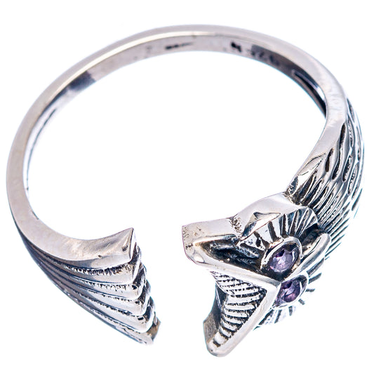 Sterling silver open-style owl ring with purple gemstone accents on band