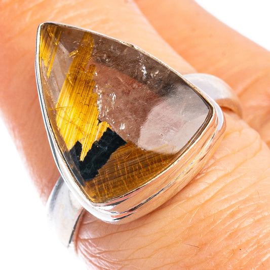 Sterling silver ring with teardrop rutilated star quartz cabochon, gold and brown tones.
