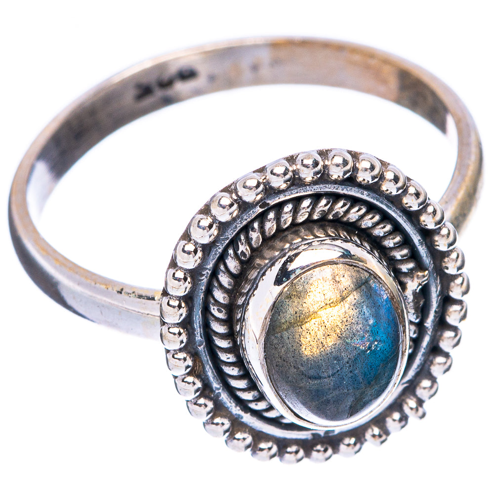 Sterling silver oval labradorite cabochon ring with beaded halo and textured band