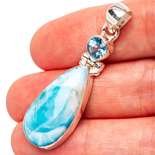 Sterling silver pendant with teardrop larimar, blue topaz accents and hinged bail