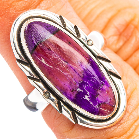 Oval purple sugilite cabochon ring in polished sterling silver with ornate bezel