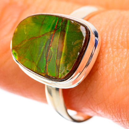 Sterling silver ring with green ammolite teardrop cabochon, bezel setting