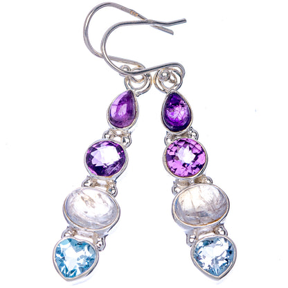Sterling silver drop earrings with purple amethyst and blue topaz, plus moonstone drops