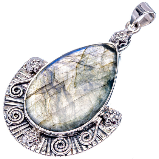 Teardrop labradorite pendant in .925 sterling silver with bail and filigree border