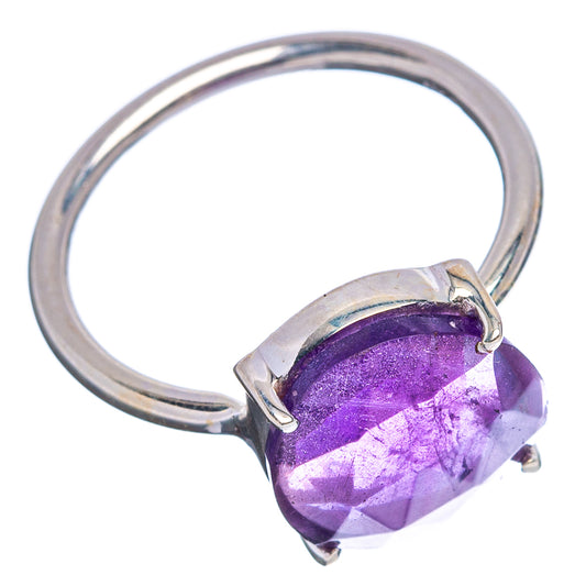 Amethyst gemstone ring in sterling silver with faceted bezel and four prongs