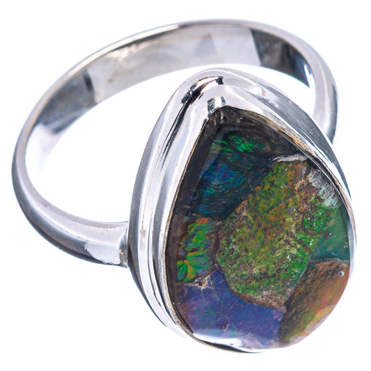 Oval ammolite ring with green-blue iridescent stone and polished sterling silver band
