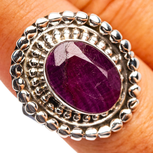 Oval purple ruby cabochon ring in .925 sterling silver with beaded halo bezel