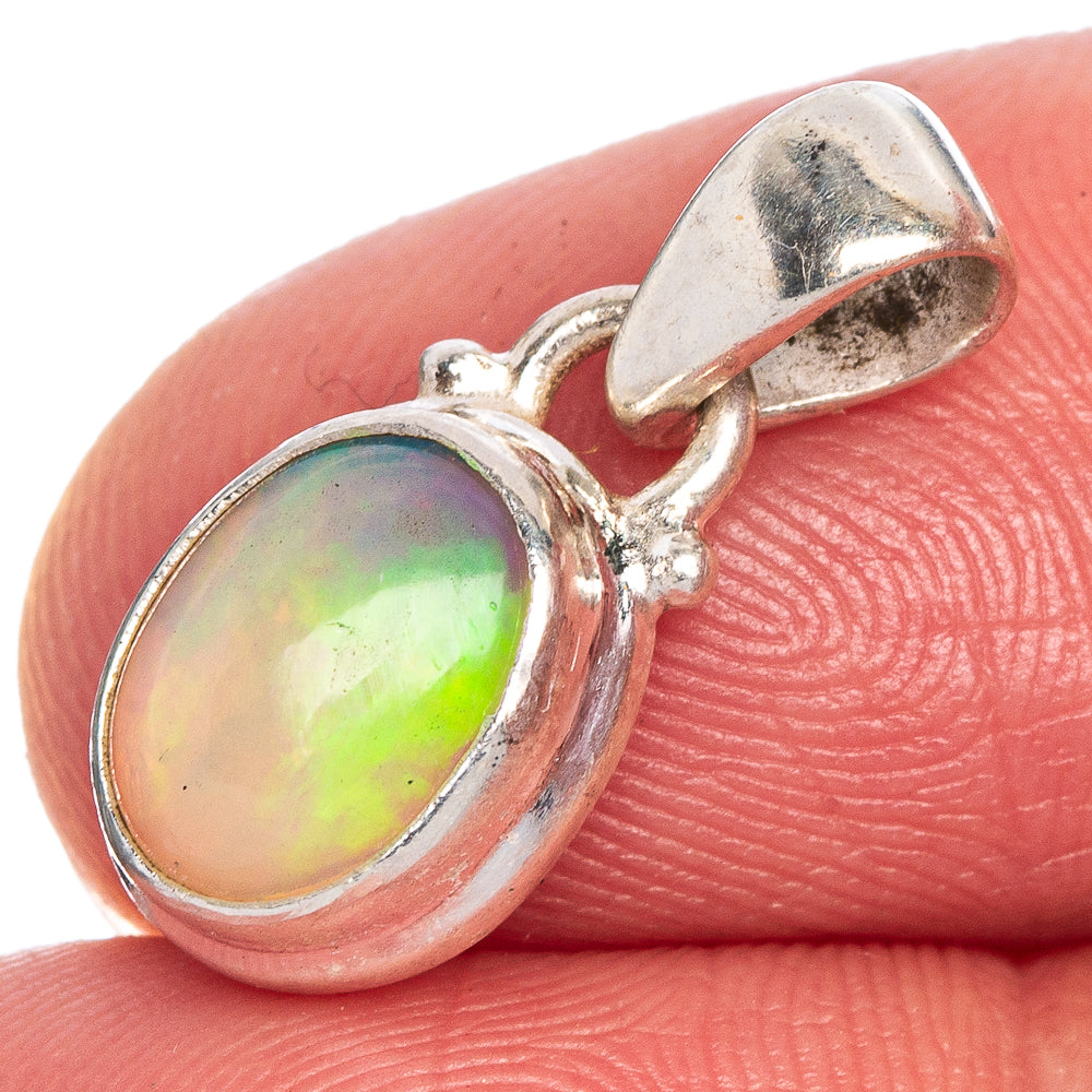Oval Ethiopian opal pendant in 925 sterling silver bezel with bail