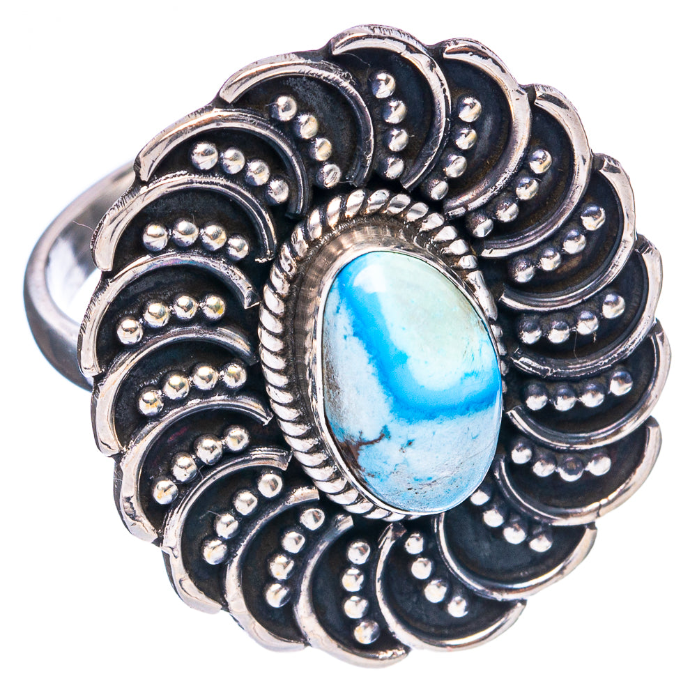 Turquoise oval cabochon sterling silver statement ring with detailed scalloped filigree.