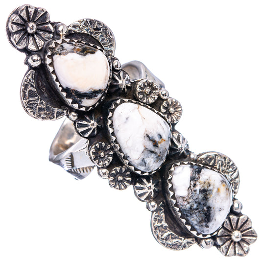Sterling silver adjustable ring with oval white cabochons, central setting, floral details.