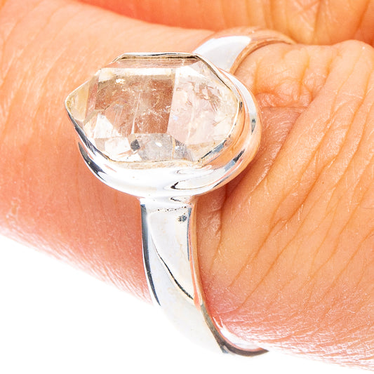 Sterling silver ring with clear faceted Herkimer diamond in open bezel setting