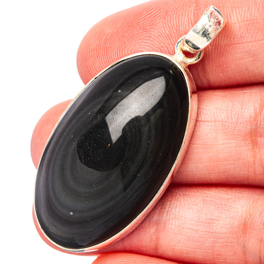 Rainbow obsidian pendant with oval bezel and .925 sterling silver bail, dark black swirls