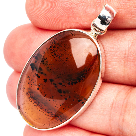 Montana agate teardrop pendant in .925 sterling silver, dark brown speckled cabochon