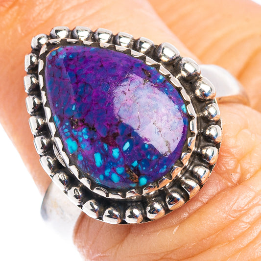 Sterling silver ring with purple-blue oval cabochon and beaded bezel band