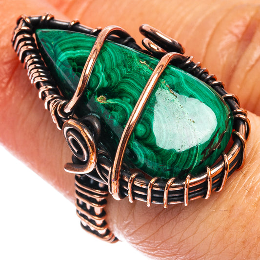 Oxidized copper wire wrap ring with teardrop green malachite cabochon, open wire band