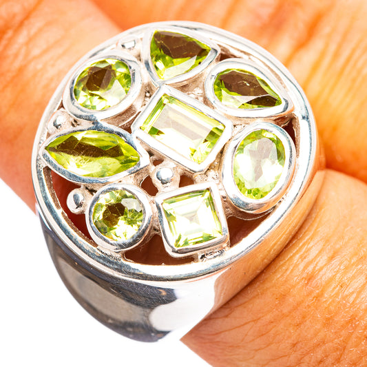 Sterling silver peridot ring with green round and square stones in openwork setting