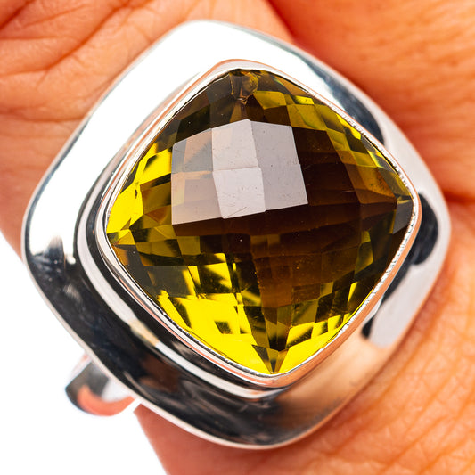 Sterling silver oval quartz ring with faceted olive-yellow gemstone, size 11.25