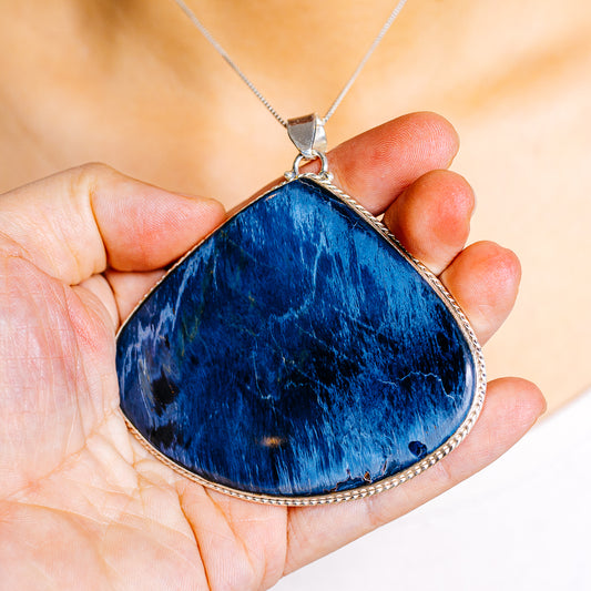 Blue pietersite teardrop pendant in .925 sterling silver bezel setting