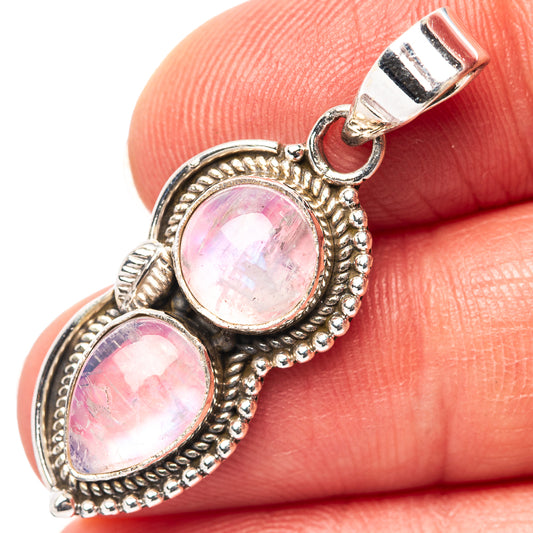 Sterling silver pink moonstone pendant with two oval stones, .925 bezel and bail.