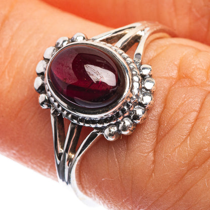 Oval garnet gemstone dainty sterling silver ring, size 6, dark red bezel