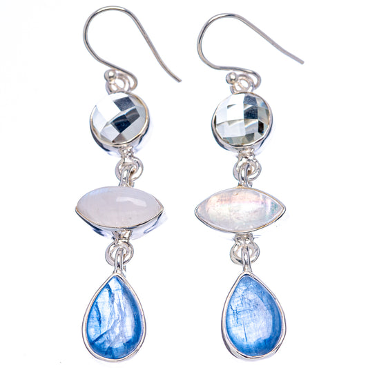 Sterling silver hook earrings with blue faceted stones, opalescent plates, and teardrop dangles