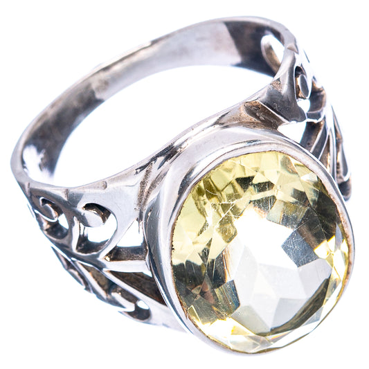 Sterling silver lemon quartz oval ring, size 8.25, raised stone with ornate sides.