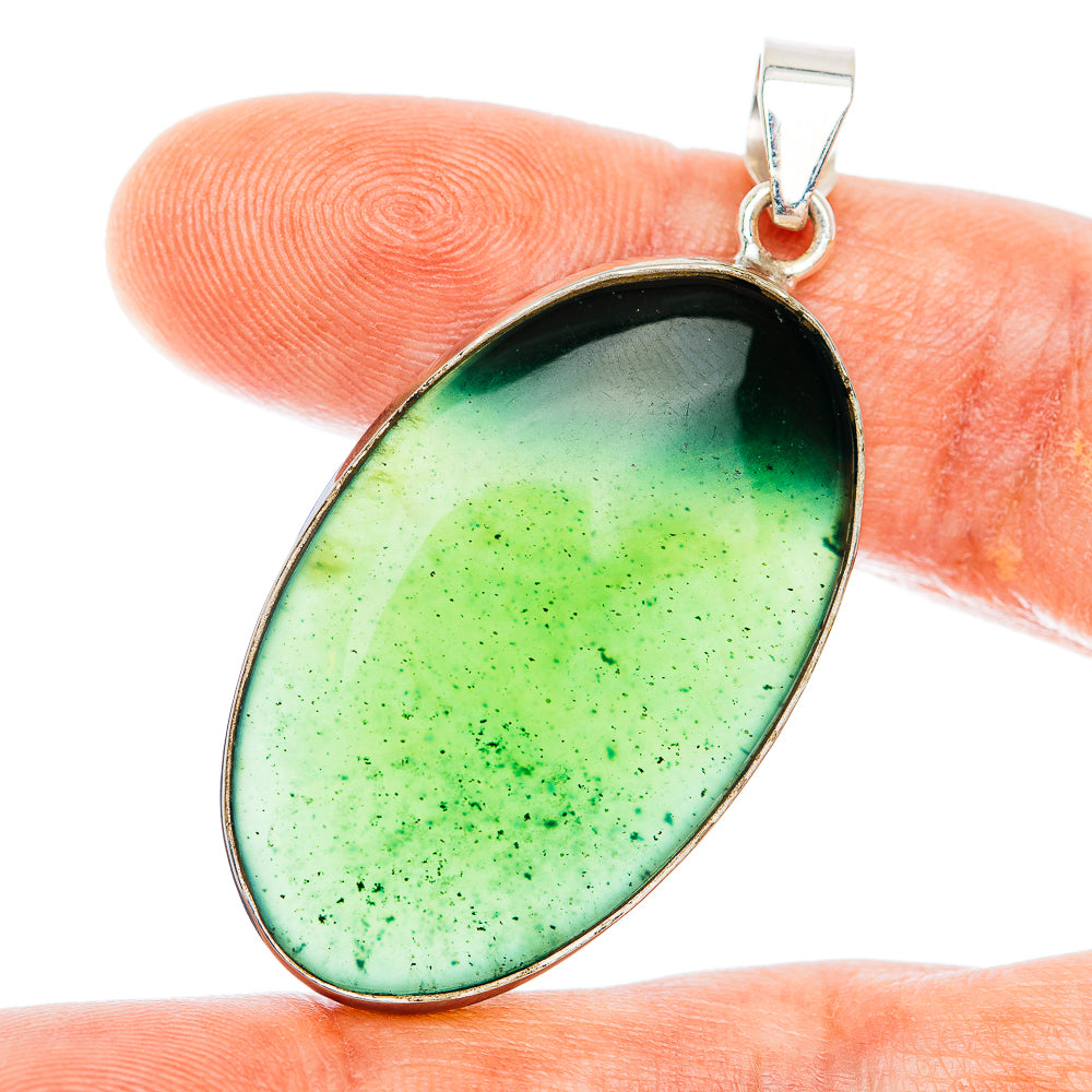 Green nephrite jade teardrop pendant with .925 sterling silver bezel and bail