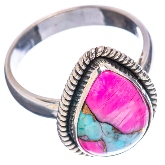Sterling silver oval cabochon ring with pink top stone, turquoise bottom, rope border
