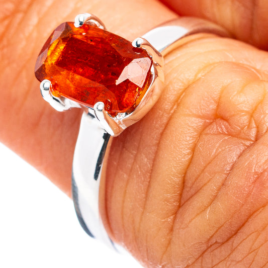 Orange kyanite gemstone ring with rectangular orange stone in sterling silver setting