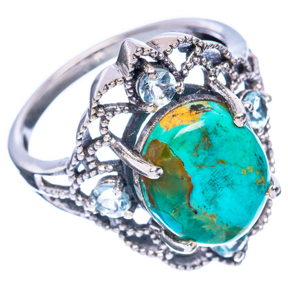 Turquoise oval cabochon sterling silver ring with cluster bezel and prong-set clear stones