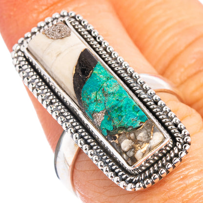 Sterling silver ring with rectangular turquoise-blue chrysocolla stone and rope border
