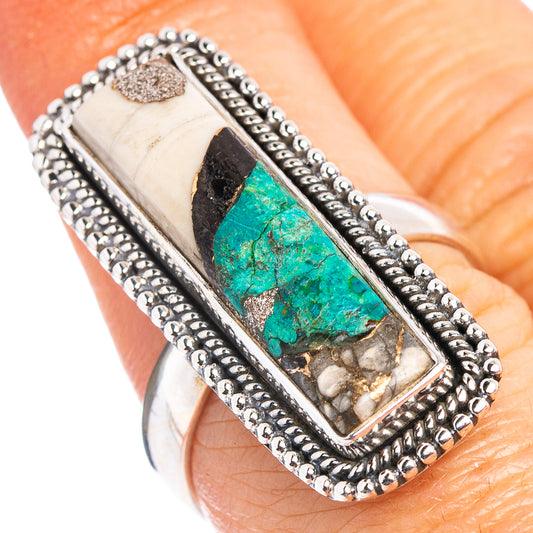 Sterling silver ring with rectangular turquoise-blue chrysocolla stone and rope border