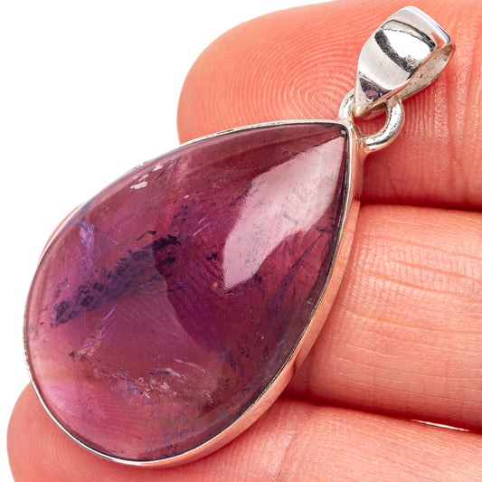 Teardrop amethyst pendant with .925 sterling silver bail, purple gemstone close-up
