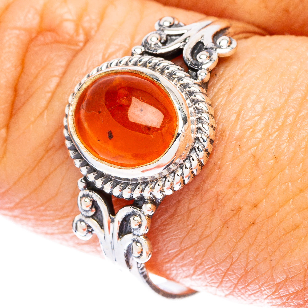 Amber oval cabochon dainty sterling silver ring with ornate scroll settings