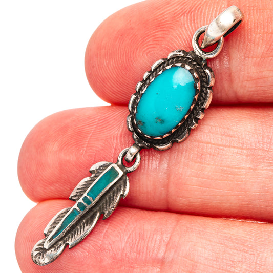 Turquoise oval pendant with feather dangle, .925 sterling silver bezel and bail clasp
