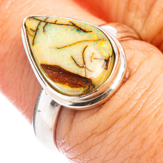 Sterling silver ring with oval green and orange opal cabochon, size 6.75