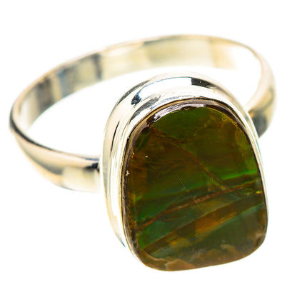 Sterling silver ring with green ammolite oval cabochon bezel and smooth band
