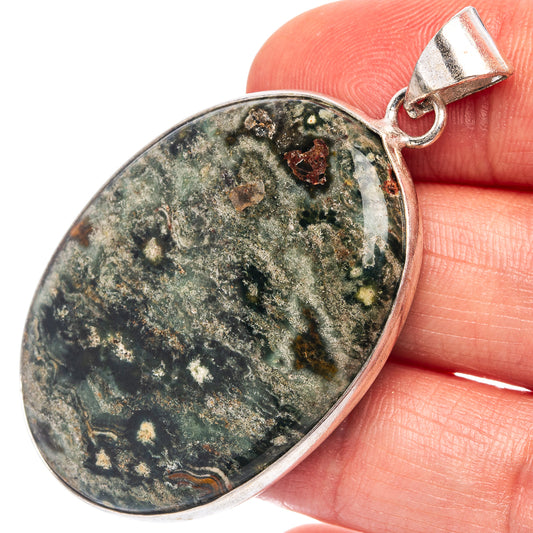 Silver-plated jasper pendant with oval green-and-blue stone, silver bezel and bail