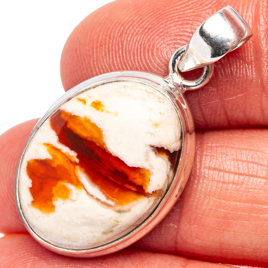 Oval fire opal cabochon sterling silver pendant with loop bail, close-up