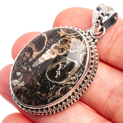 Oval sterling silver turritella agate pendant with bail and beaded border