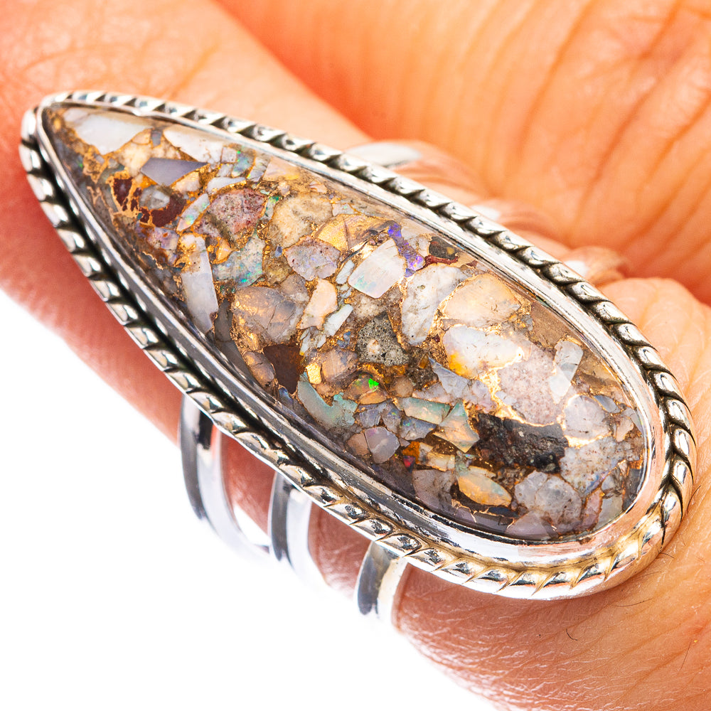 Oval bezel-set ring with copper composite rainbow moonstone mosaic, sterling silver band