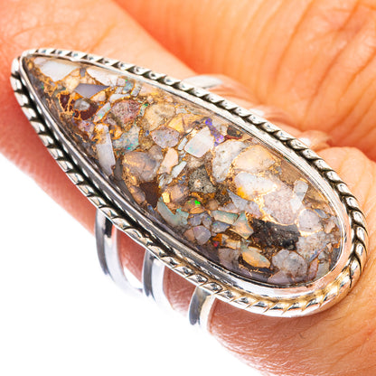 Oval bezel-set ring with copper composite rainbow moonstone mosaic, sterling silver band