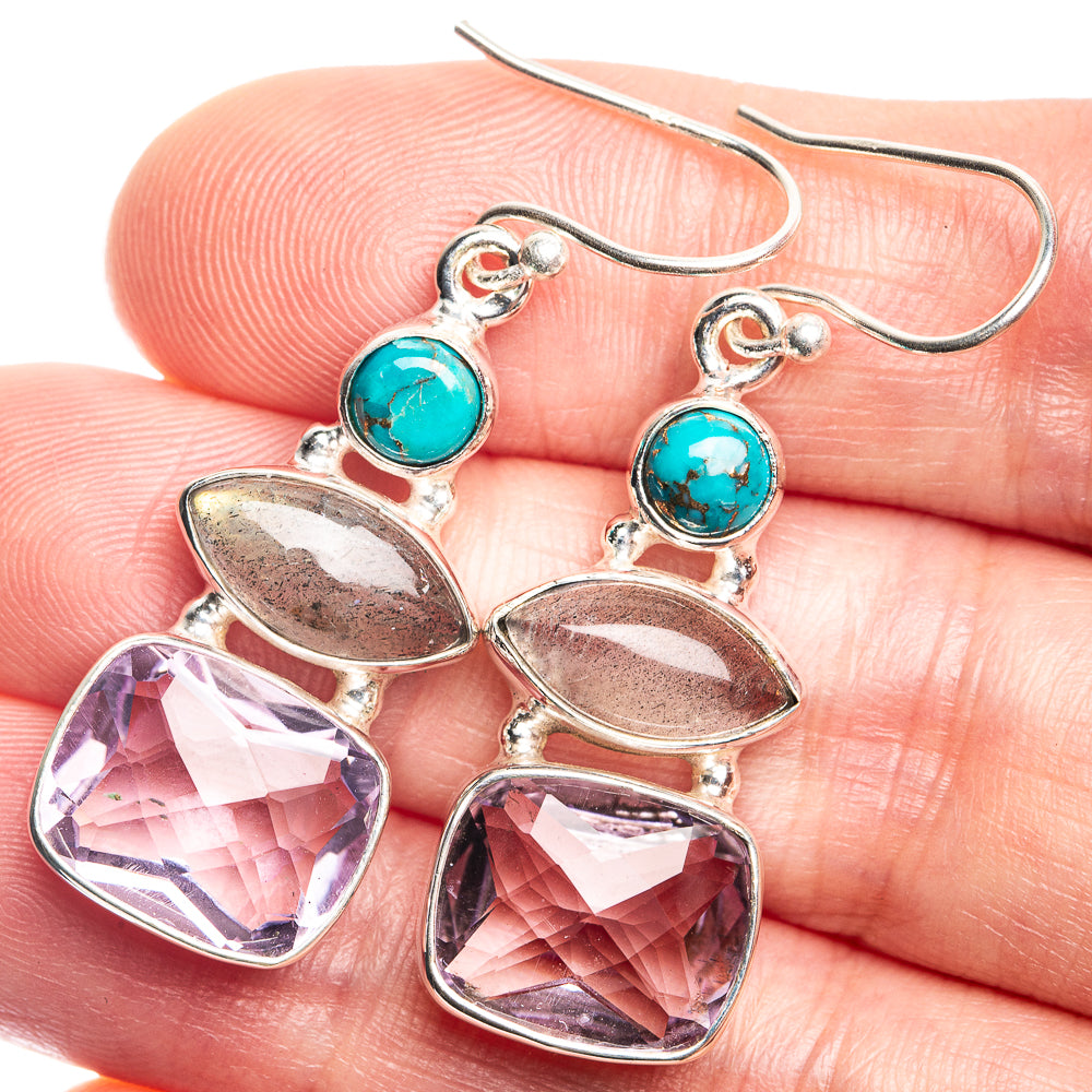 Sterling silver drop earrings with turquoise round cabochon and purple faceted stones