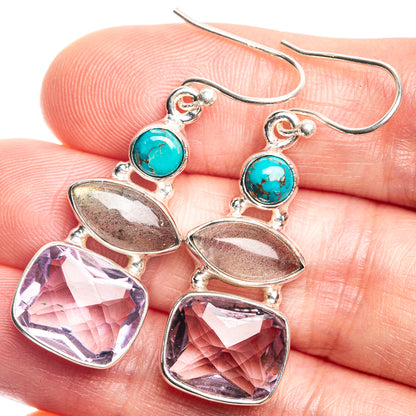 Sterling silver drop earrings with turquoise round cabochon and purple faceted stones