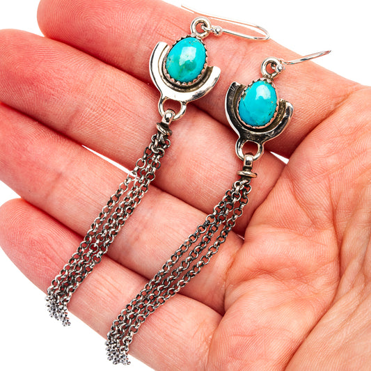 Turquoise and sterling silver drop earrings with oval cabochon and chain tassels