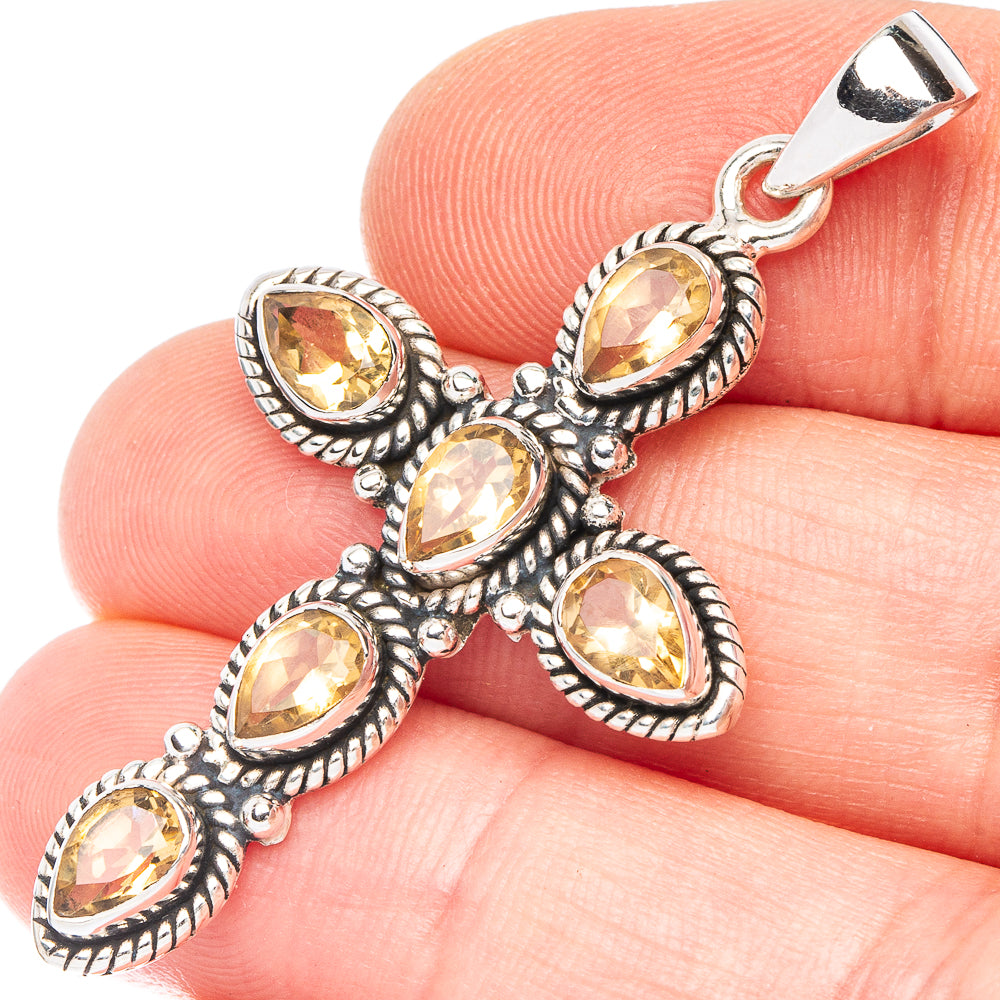 Sterling silver cross pendant with faceted citrine glass stones