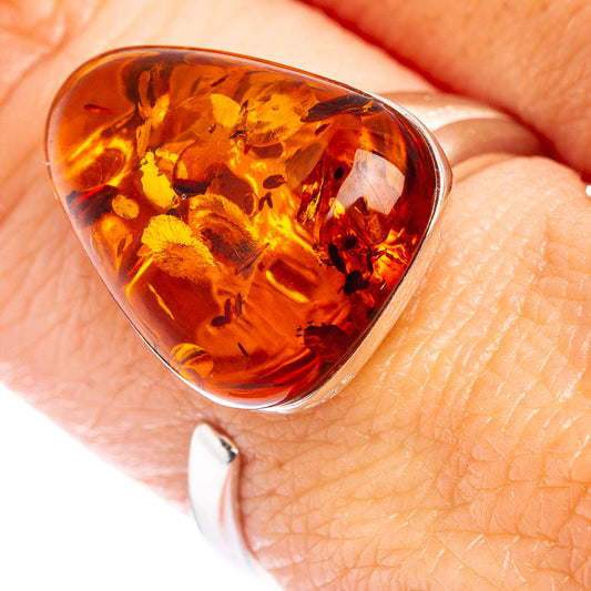 Heart-shaped Baltic amber cab ring in polished .925 sterling silver band